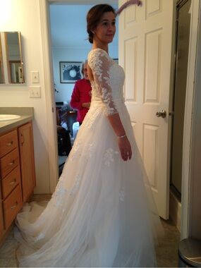 Elegant White Lace A-Line Wedding Dress with Sheer Long Sleeves